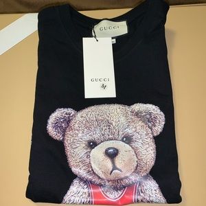 Mens M tee shirt INSPIRED. This is in perfect condition and
brand new NWT.